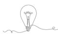 Light bulb continuous one line drawing on white background Royalty Free Stock Photo