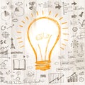 Light bulb with drawing business success strategy