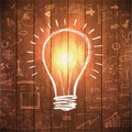 Light bulb with drawing business success strategy Royalty Free Stock Photo