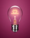 Light Bulb with Filament Forming a Heart Icon