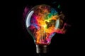 Light bulb filled with colorful fire, representing concept of new life and new ideas Royalty Free Stock Photo