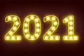 Light bulb flashing in number 2021 for happy new year 2021 new year eve celebration background Royalty Free Stock Photo