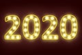 Light bulb flashing in number 2020 for happy new year 2020 new year eve celebration background Royalty Free Stock Photo