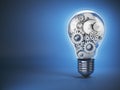 Light bulb and gears. Perpetuum mobile. Innovation, creativity Royalty Free Stock Photo