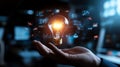 Light bulb glowing in hand, technology interface overlay, innovation concept Royalty Free Stock Photo