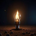 a light bulb is on the ground with rocks Royalty Free Stock Photo