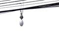 A light bulb hanging on an electricity lines , white isolated background with copy space Royalty Free Stock Photo