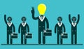 Light bulb headed businessmen In the center of a group of people.