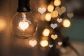 Light bulb with heart shape lighting for Valentine`s day Royalty Free Stock Photo