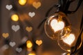 Light bulb with heart shape lighting for Valentine`s day Royalty Free Stock Photo