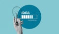 Light bulb held in hand with idea progress loading bar concept, creative thinking and innovation Royalty Free Stock Photo