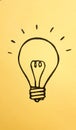 Light bulb icon representing ideas, creativity and innovation in a colorful yellow banner background Royalty Free Stock Photo