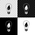 Light bulb with leaf icon isolated on black, white and transparent background. Eco energy concept. Vector Royalty Free Stock Photo