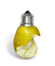 Light bulb made from bitten off green pear isloated on white background. Photomanipulation Royalty Free Stock Photo