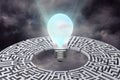 light bulb with maze graphic Royalty Free Stock Photo