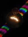 Light bulb and rainbow Royalty Free Stock Photo