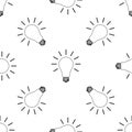 Light bulb with rays shine icon seamless pattern on white background. Energy and idea symbol. Lamp electric Royalty Free Stock Photo