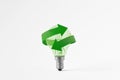 Light bulb with recycling symbol on white background - Concept of ecology and green energy