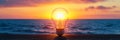 Light Bulb with Sunset Over Ocean A glowing light bulb stands on a wooden surface with a beautiful sunset and ocean waves in Royalty Free Stock Photo