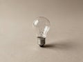 Light Bulb on Table Close Up - AI generated Royalty Free Stock Photo