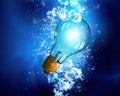 Light bulb under water Royalty Free Stock Photo