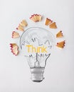 light bulb word design THINK with pencil saw dust Royalty Free Stock Photo