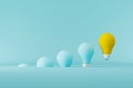 Light bulb yellow floating outstanding among lightbulb light blue on background Royalty Free Stock Photo