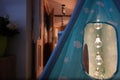 Light bulbs in children tent at room in evening