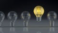 Light bulbs with glowing one different idea. Creativity and innovation ideas concept. Royalty Free Stock Photo
