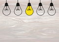 Light bulbs icon with concept of idea. Vector on wooden background. Contour line Royalty Free Stock Photo