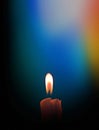 The light of the candle cuts through the darkness Royalty Free Stock Photo