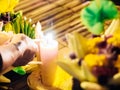 Light the candle by man hand for pray from loykratong festival a