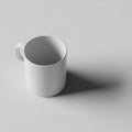 Light casts a shadow from the mug indicating its three dimensional Royalty Free Stock Photo