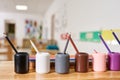 Light class in Montessori kindergarten. The colorful Montessori pencil holders is in the foreground. nobody