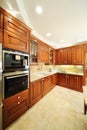 Light clean kitchen with wooden furniture