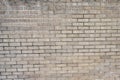 Light colored brick and cement wall