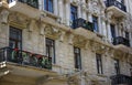 Light colored building balconies in the sun