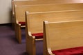 Light colored Church pews Royalty Free Stock Photo