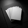 The light-colored notebooks and the dark background, emphasizin Royalty Free Stock Photo