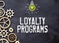 notebook with the text LOYALTY PROGRAM. Business concept.