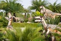 Light colour Dinosaur statue in the garden. It`s ChiangRai province, North of Thailand Royalty Free Stock Photo