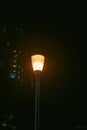 Light colunm at night, neon street lamp Royalty Free Stock Photo