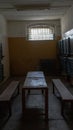 Light Coming in Through Prison Cell Bars Window. Empty Jail Cells. Prison Interior.