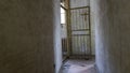 Light Coming in Through Prison Cell Bars Window. Empty Jail Cells. Prison Interior.