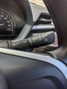 light control of headlights adjustment lever in a car