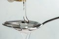 Pouring Light Corn Syrup on a Spoon Royalty Free Stock Photo