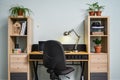 Light cozy teen room with white bookcases Royalty Free Stock Photo