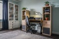 Light cozy teen room with white bookcases and working desk Royalty Free Stock Photo