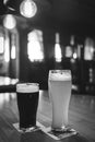 Light and dark beer in a glass, black and white frame