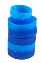 Light and dark blue water bottle caps isolated on a white background Royalty Free Stock Photo